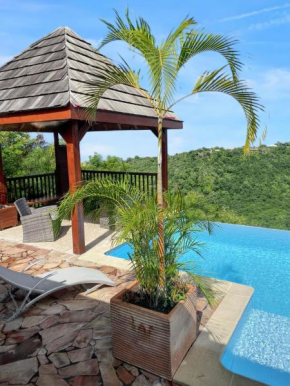 Charmant Bungalow avec vue sur la mer à Marigot, 60 m², piscine.